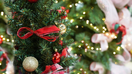 Holiday Christmas tree glowing with warm twinkling lights