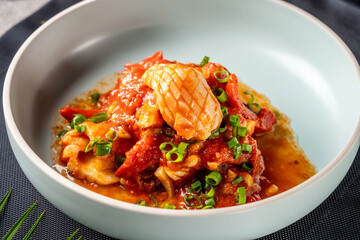 Spicy squid in tomato sauce