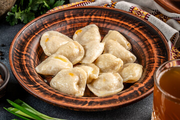 Traditional Ukrainian varenyky on rustic plate