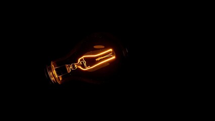 A glowing lightbulb against a dark backdrop, symbolizing creativity and bright ideas.