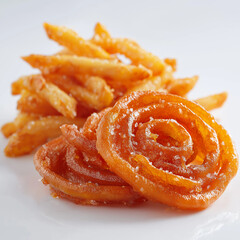 sweet and crispy jalebi crispy fried snacks on a plate PNG image, transparent background