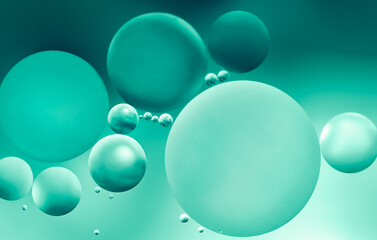 abstract green macrophotography of oil in water