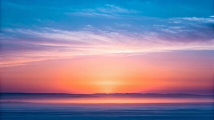 Fototapeta premium Stunning sunrise with vibrant sky over misty hills, evoking peace and inspiration for travel, nature, and wellness campaigns, a serene landscape