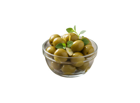 Small glass bowls filled with  green olives sit on white background