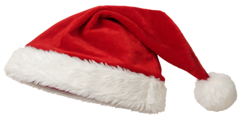Festive Santa hat resting on white background, showcasing classic red velvet and fluffy trim. Perfect Christmas accessory for holiday design themes. Ideal winter decoration element. 