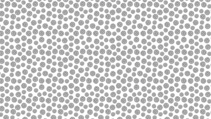 A dense arrangement of small circular shapes with intricate internal designs on a white background