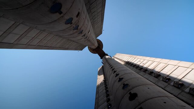 View of Belgrade&rsquo;s Genex Tower, Serbia, showcasing brutalist architecture low angle drone view