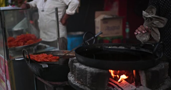 Traditional Indian Jalebi Making &ndash; Batter Pouring, Frying, and Dipping in Sugar Syrup
