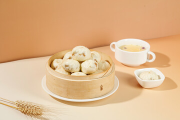Traditional Pork Dumplings in Bamboo Steamer with Tea - Asian Cuisine Food Photography