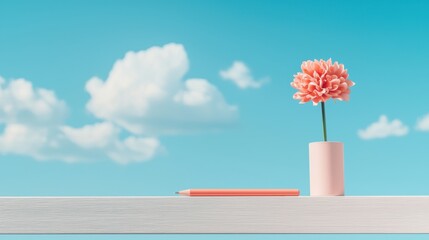 Pen resting on a minimalist desk setup with fluffy white clouds passing by outdoors