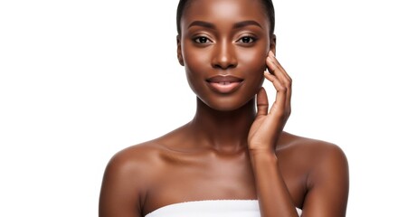 Beautiful young african american woman touches her cheek. Skincare and beauty concept. Young lady with healthy clear skin.