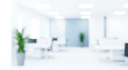 Soft focus bright office interior with plants and desks blur