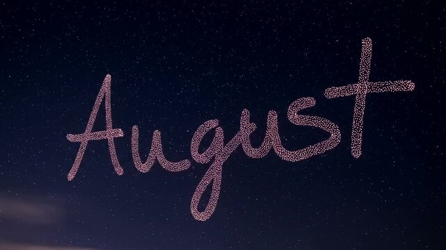 Handwritten Word August In Pink Chalk On A Blackboard.