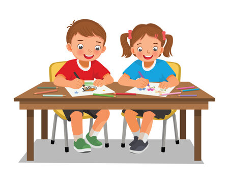 Two kids students drawing coloring at the table together