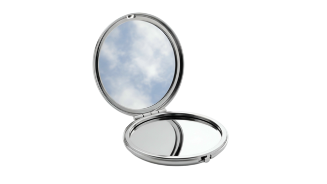 Open silver compact mirror reflecting a cloudy blue sky, isolated on black