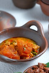 Javanese cattle skin spicy stew dish or cattle skin crackers (krecek,krechek), cooking with tempeh...