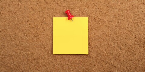 Red pin and yellow notepaper used for location marking in map navigation, emphasizing spatial planning and navigation tools
