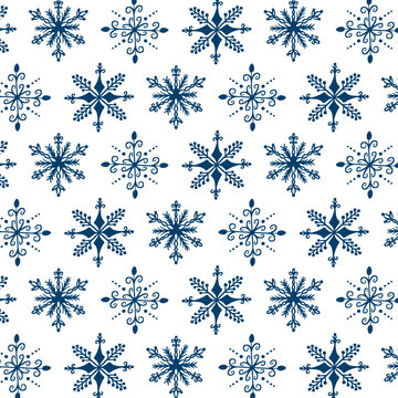 Hand-Drawn Dark Blue Snowflakes Pattern on White Background