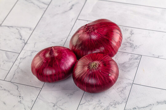 Raw ripe purple onion bulb