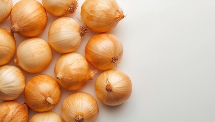 Group of yellow onions isolated on white background for culinary preparation, emphasizing freshness and ingredient clarity