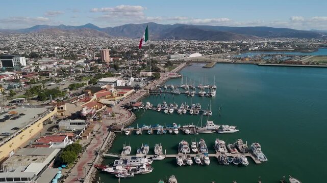 Ensenada Metropolitan Aerial by the Bay Shoreline with Huge Mexican Flag Yachts Ship Yard