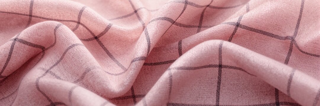 Blurry fabric with a checkered pattern, used as a stylish background for text or layout design