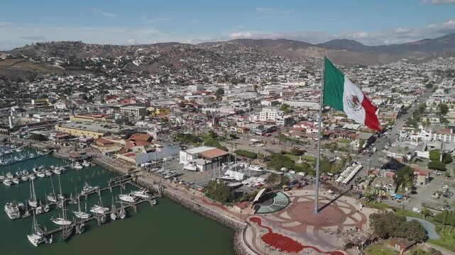 Ensenada Metropolitan Aerial by the Bay Shoreline with Huge Mexican Flag Yachts Ship Yard.