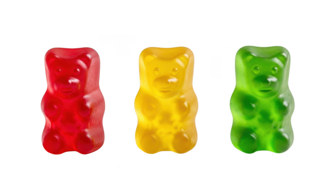 Red yellow green gummy bears lined up, sweet chewy candy treat