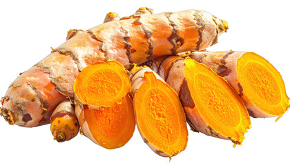 Several turmeric rhizomes, some sliced to reveal bright orange interior, laid out