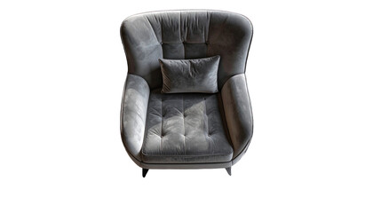 Overhead shot of a plush, button-tufted gray armchair with a matching lumbar pillow