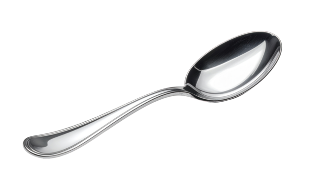 A reflective, silver spoon angled diagonally, set against a stark black background