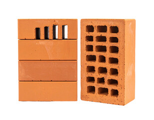 Two orange-red clay blocks, one cut, showing interior construction details