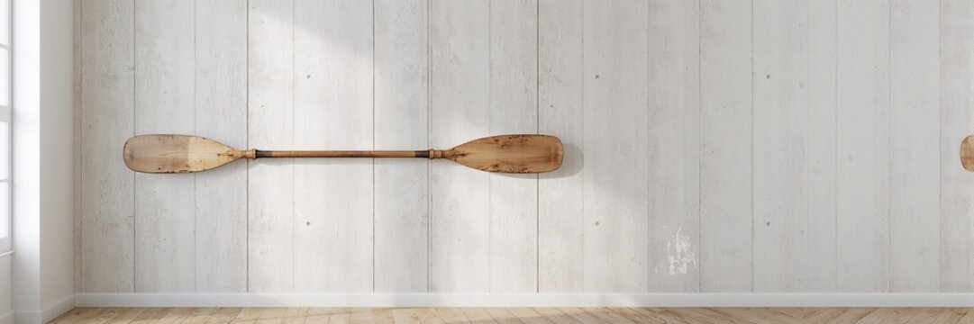 Double paddle paddles mounted on a wall, suitable as a decorative sports display or storage solution