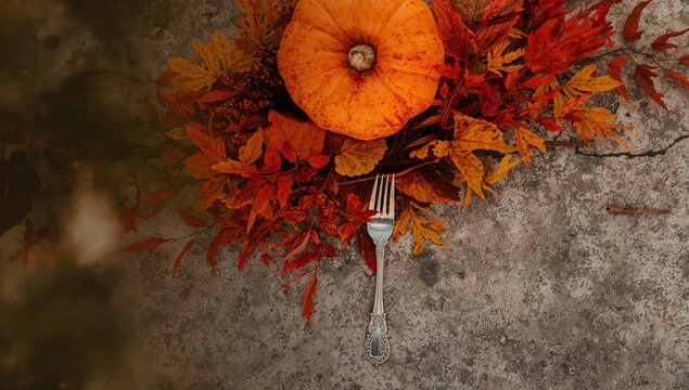 Autumn scene with fallen red leaves and pumpkin on a stone table, emphasizing seasonal change - Powered by Adobe