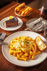 cookies, pasta and cake on a plate
