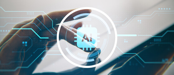 Close-up of hand interacting with tablet featuring AI microchip icon and futuristic digital interface overlay on light background technology concept.