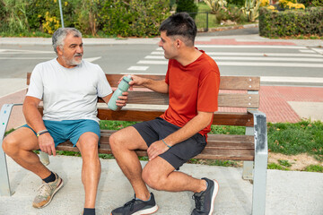 Father and son sharing a moment after exercising