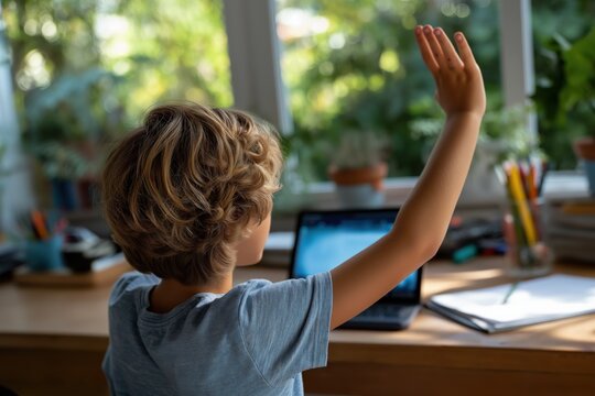 Caucasian child engaged in online learning at home by window