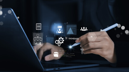 Businessman working with AI powered CRM dashboard displaying data analytics, customer insights, workflow automation, digital tools, representing smart customer management, modern business technology.
