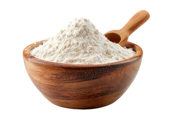 Flour in a wooden bowl, spoon resting on the powder