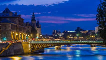 Le Pont D'Arcole bridge after sunset with boats day to night timelapse, Paris, France, Europe