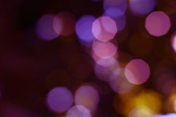 Abstract Circular Bokeh Lights Evoke a Dreamy Ambiance with Purple and Pink Hues