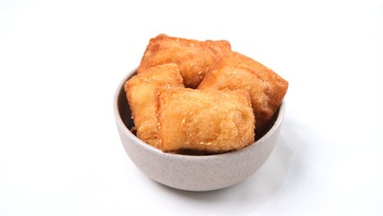 Crispy Fried Dough Sticks in a Bowl on White