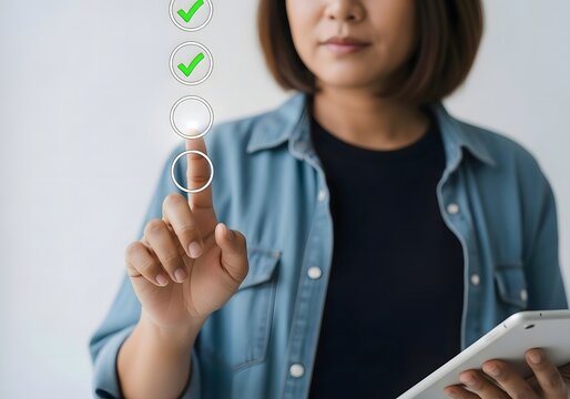 Woman using touchscreen device with checkmarks and circles for options selection process shown - Powered by Adobe