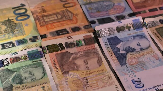 Bulgaria change currency, Bulgaria Lev to Euro. Money exchange. Paper banknotes on table. Concept, economy, competition, crisis, banking and finance. BGN,BGL. Scene C. Close up slide shot.