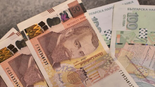 Bulgaria change currency, Bulgaria Lev to Euro. Money exchange. Paper banknotes on table. Concept, economy, competition, crisis, banking and finance. BGN,BGL. Scene W. Close up slide shot.