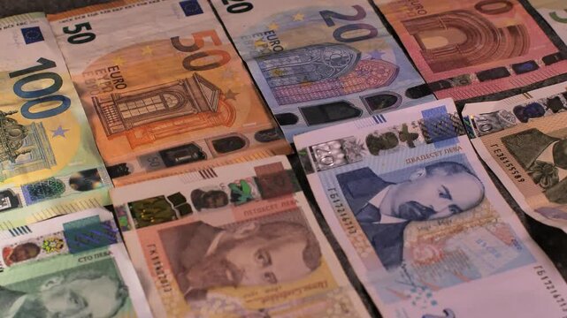 Bulgaria change currency, Bulgaria Lev to Euro. Money exchange. Paper banknotes on table. Concept, economy, competition, crisis, banking and finance. BGN,BGL. Scene B. Close up slide shot.