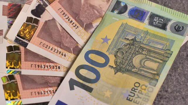 Bulgaria change currency, Bulgaria Lev to Euro. Money exchange. Paper banknotes on table. Concept, economy, competition, crisis, banking and finance. BGN,BGL. Scene B. Slide up shot.