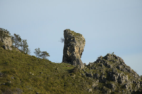 Suns reflection on Pedernal peak amidst Val del As&oacute;n... - Catch the breathtaking view of Pedernal mountain peak from a distant perspective in Val del As&oacute;n, Cantabria. Captured during a sunny day...