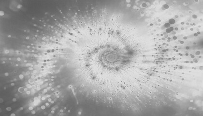 Abstract swirling vortex of light and dark particles in grayscale